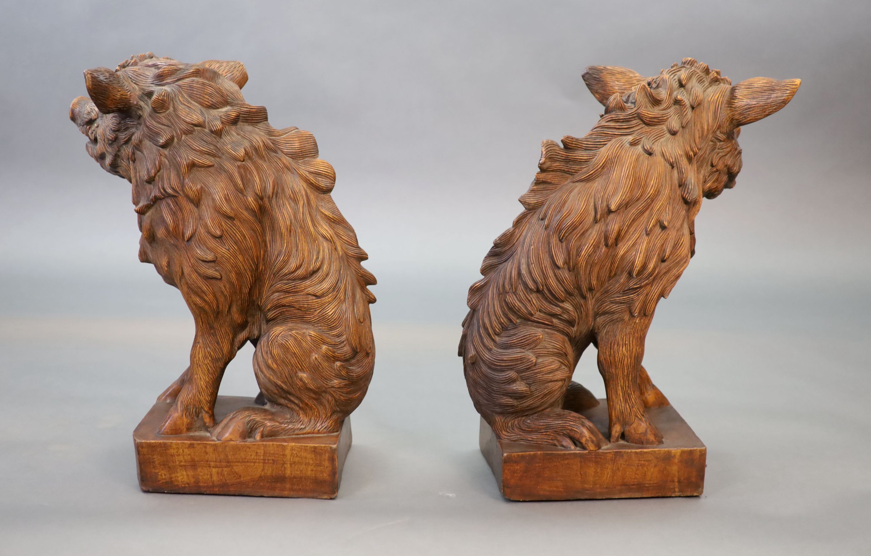 After Pietro Tacca (1577-1640), a pair of early 20th century walnut carvings 42cm wide, 55cm high (maximum)